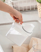 Pojemnik pudełko organizer z miarką na proszek płyn do prania płukania 1,1l 1100 ml bezbarwny, biały