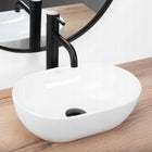 Umywalka nablatowa mała owalna biała do WC REA amelia mini na blat ceramiczna misa łazienkowa bez otworu na baterię 37