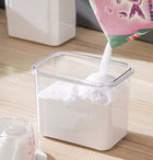 Pojemnik pudełko organizer z miarką na proszek płyn do prania płukania 1,1l 1100 ml bezbarwny, biały