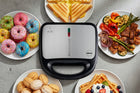 Opiekacz wielofunkcyjny ST250 Eldom 5 w 1 Tosty Grill Gofry Orzeszki Donaty nominalna srebrny/szary