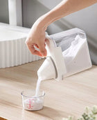 Pojemnik pudełko organizer z miarką na proszek płyn do prania płukania 1,1l 1100 ml bezbarwny, biały
