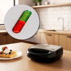Opiekacz wielofunkcyjny ST250 Eldom 5 w 1 Tosty Grill Gofry Orzeszki Donaty nominalna srebrny/szary