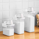 Pojemnik pudełko organizer z miarką na proszek płyn do prania płukania 1,1l 1100 ml bezbarwny, biały